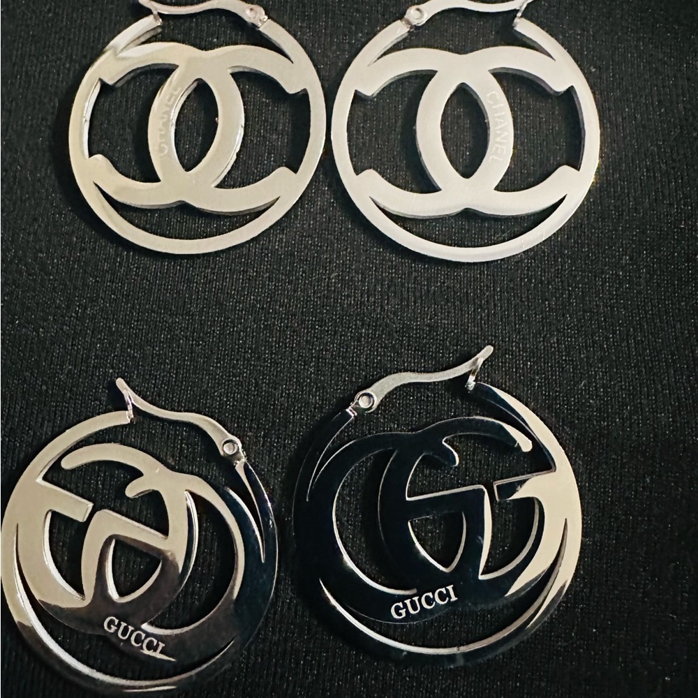 Gucci Silver Cutout Logo Earrings